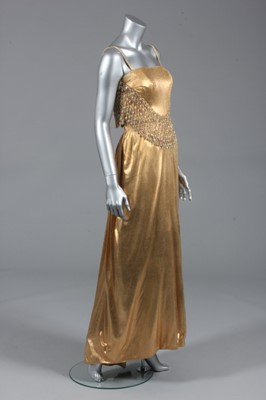 Lot 147 - A Veneziani cloth of gold evening gown, early...