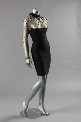 Lot 103 - An Hervé Leger couture black `bandage' dress,...