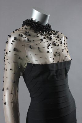 Lot 103 - An Hervé Leger couture black `bandage' dress,...