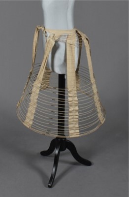 Lot 117 - A cage crinoline, circa 1875, the woven cotton...