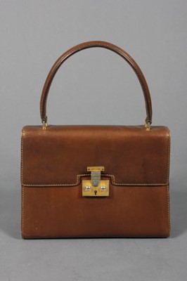 Lot 130 - A Gucci brown pigskin handbag, circa 1971,...