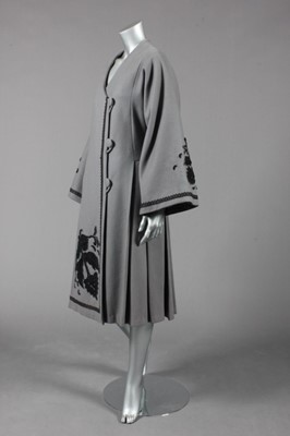 Lot 143 - An Edwardian-style grey wool coat, with black...