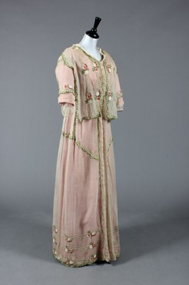 Lot 156 - A Bradleys & Sons, London embroidered muslin...