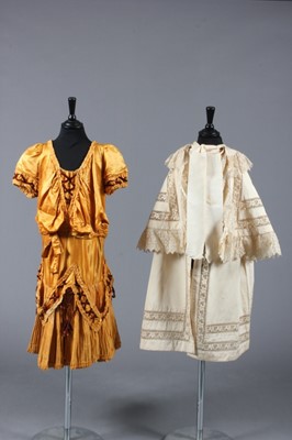 Lot 161 - A girl's gold satin party dress circa 1905,...