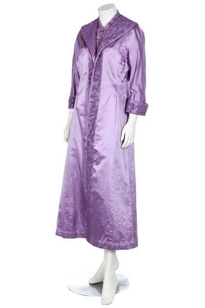 Lot 246 - An elaborately-beaded lilac satin and chiffon...