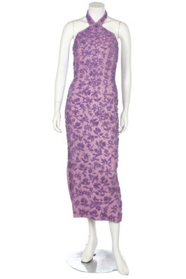 Lot 246 - An elaborately-beaded lilac satin and chiffon...