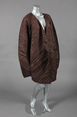 Lot 186 - An Issey Miyake brown pleated jacket, 1990s,...