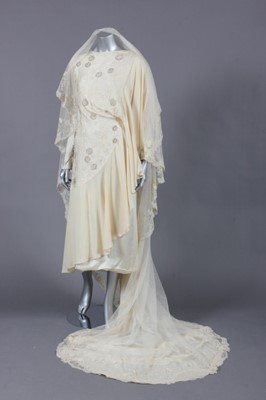 Lot 233 - A couture bridal gown and veil, reputedly made...