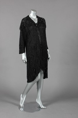 Lot 249 - A black beaded tulle opera coat, 1920s, lined...