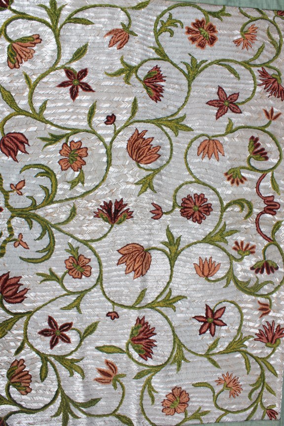 Lot 251 - A panel of chenille embroidery and beadwork,