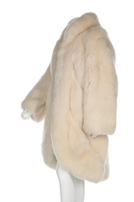 Lot 58 - A Dior arctic-fox fur coat, 1970s or 80s,...