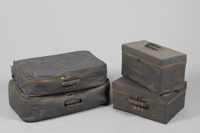 Lot 26 - A suite of powder blue leather luggage,...