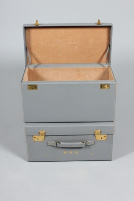 Lot 26 - A suite of powder blue leather luggage,...