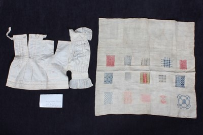 Lot 270 - A darning sampler, initialled S.K. and dated...