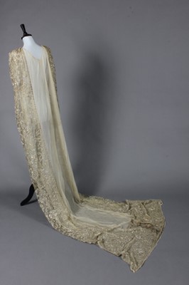 Lot 272 - A gold tulle and lace bridal train, circa 1920,...