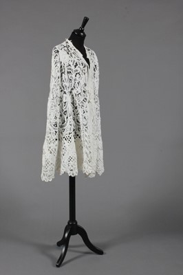 Lot 277 - A tapelace and Irish crochet cape, circa 1910,...