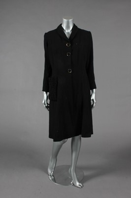 Lot 280 - An Agnes Drecoll black wool day coat, French,...