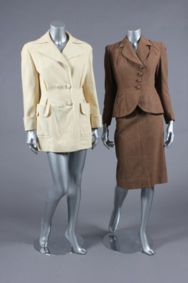 Lot 282 - A stylish brown tweed suit, early 1950s,...