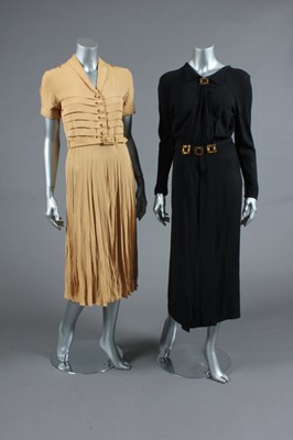 Lot 284 - A stylish black crepe dinner dress, 1930s,...