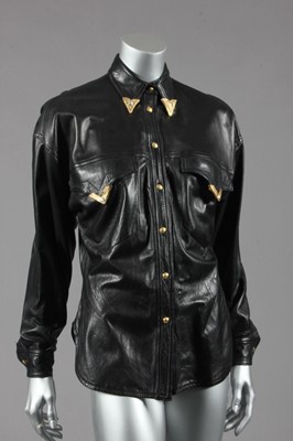 Lot 308 - A Gianni Versace black leather cowboy-style...