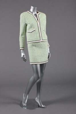 Lot 311 - A Chanel suit, 1990s, boutique labelled and...