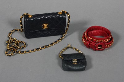 Lot 322 - A Chanel navy quilted leather miniature...