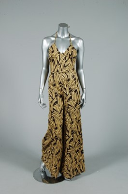 Lot 341 - A Biba printed cotton halter-neck jump suit,...