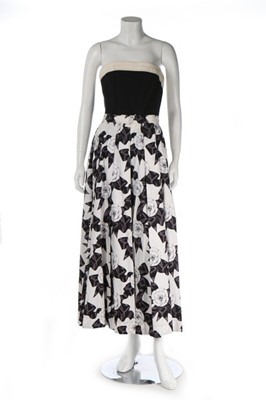 Lot 223 - A Chanel cotton pleated skirt printed with...