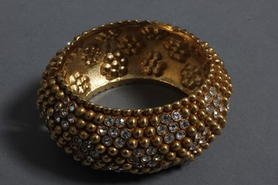 Lot 364 - An Yves Saint Laurent gilt metal and...