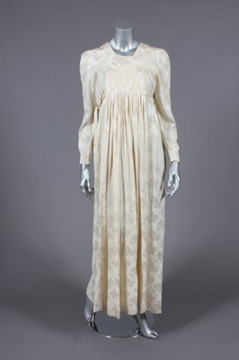 Lot 374 - An Ossie Clark ivory damask silk smock dress,...