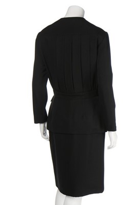 Lot 237 - A Chanel tailored black dress, 1983, Boutique...