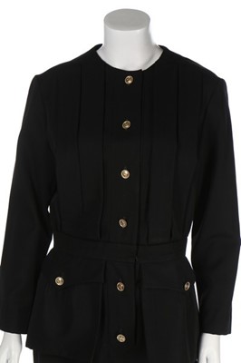 Lot 237 - A Chanel tailored black dress, 1983, Boutique...
