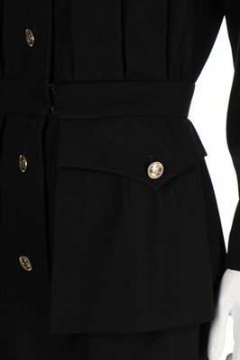 Lot 237 - A Chanel tailored black dress, 1983, Boutique...