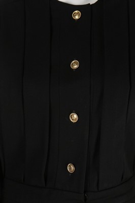 Lot 237 - A Chanel tailored black dress, 1983, Boutique...