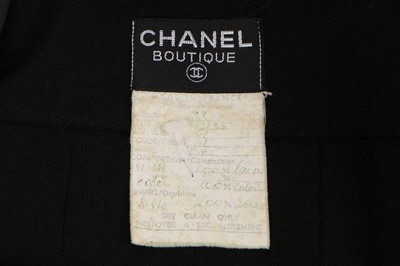 Lot 237 - A Chanel tailored black dress, 1983, Boutique...