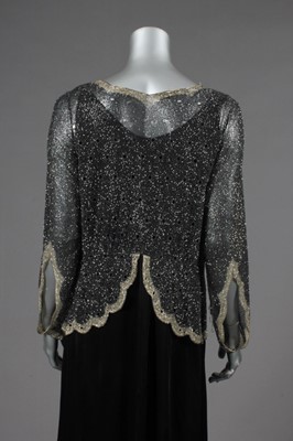 Lot 389 - A beaded and cutwork evening jacket, late...