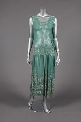 Lot 390 - A poor condition jade green chiffon beaded...