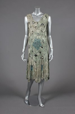 Lot 391 - A heavily beaded and embroidered couture dress,...