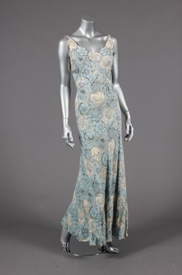 Lot 396 - A pale blue and white crepe bias cut evening...