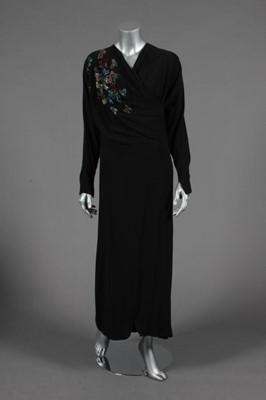 Lot 398 - A Howard Greer black crepe dinner dress, 1940s,...