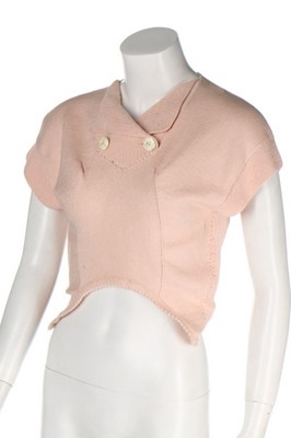 Lot 240 - A John Galliano pink hand-knitted top,...