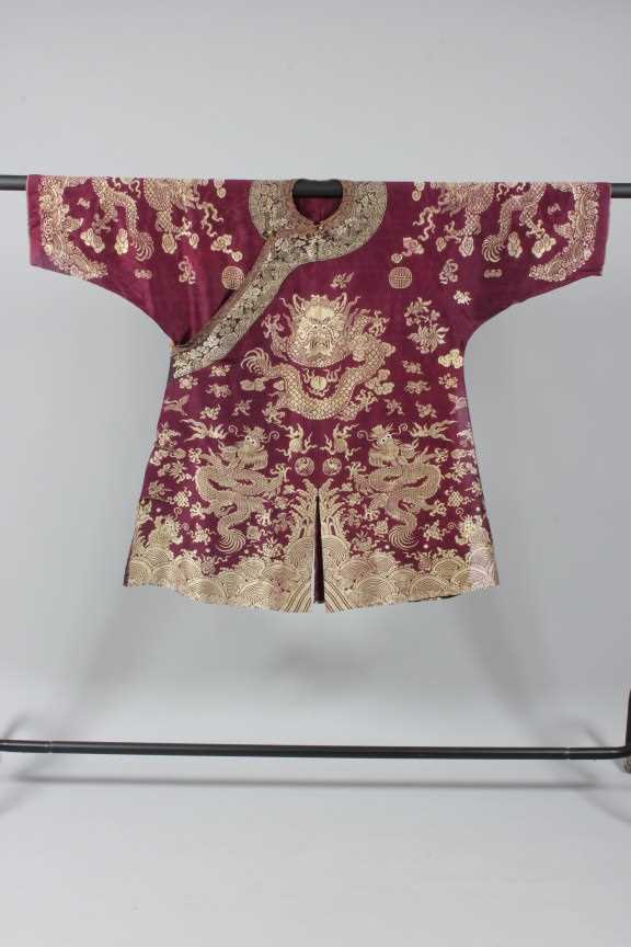 Lot 53 A brocaded wine silk dragon robe, jifu, circa
