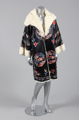 Lot 55 - A Chinese embroidered and fur lined evening...