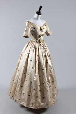 Lot 61 - A Spitalfields brocaded silk gown, the silk...