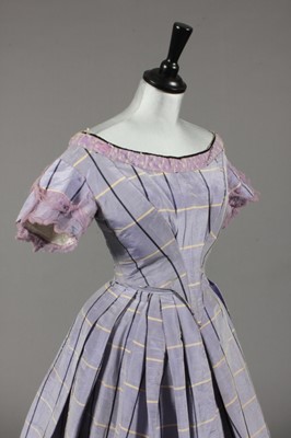 Lot 63 - A lilac tartan moire taffeta gown with day and...