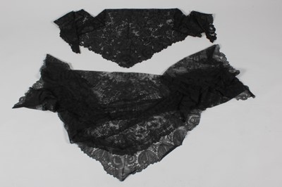 Lot 7 - A fine black Chantilly bobbin lace shawl,...