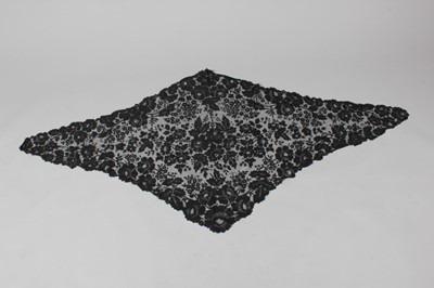 Lot 7 - A fine black Chantilly bobbin lace shawl,...