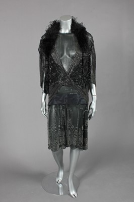 Lot 81 - A beaded flapper dress, French, late 1920s,...