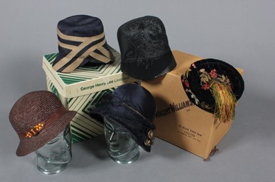 Lot 92 - A group of hats, three 1920s cloches by Madame...