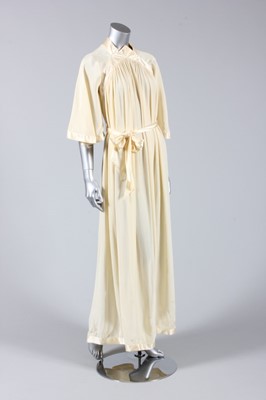 Lot 120 - An Ossie Clark ivory river-crepe gown, 1975,...
